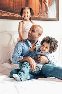 Father Having Fun With His Children Photo thumbnail