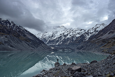 Hooker Lake landscape with clouds and fog with mountains in New Zealand thumbnail