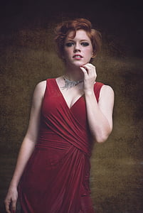 woman in red sleeveless dress painting thumbnail