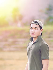 man standing on field thumbnail
