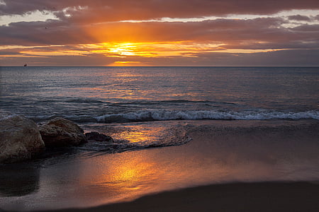 landscape photography of sea waves at shore during golden hour thumbnail