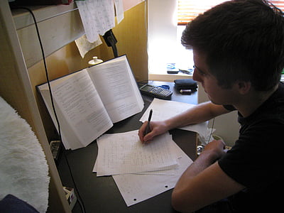 man wearing shirt holding pen thumbnail