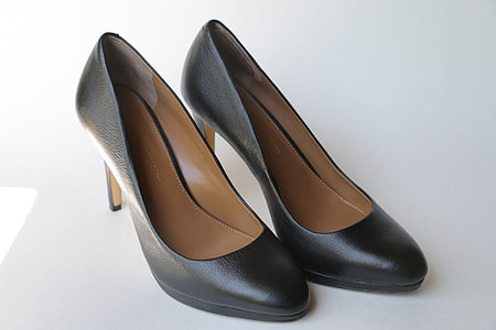 pair of black-and-brown leather pumps thumbnail