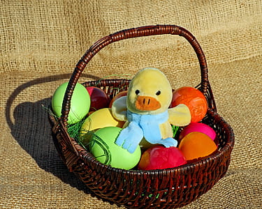 yellow chick plush toy on black wicker picnic basket thumbnail