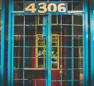 closed blue metal gate thumbnail