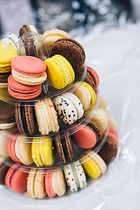 Colourful sweet macarons arranged in a tower thumbnail