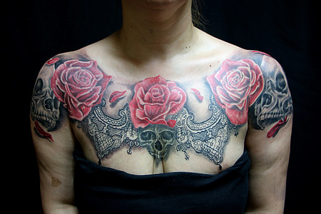 person with floral tattoo thumbnail