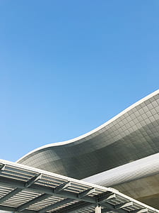 white steel roof under blue sky thumbnail