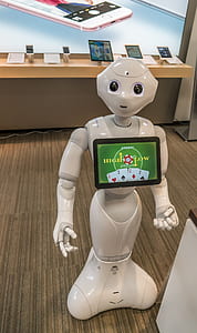 white and black robot with minitor thumbnail