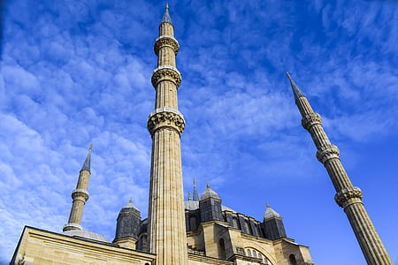 low-angle photography of gray concrete mosque thumbnail