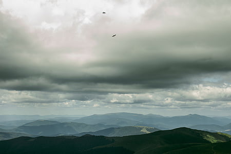 brown mountains during daytime thumbnail