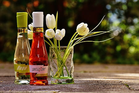 clear drinking glass with white flowers thumbnail