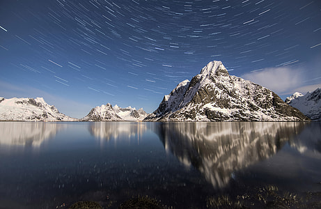 Star Trails with mountains and water in Norway thumbnail