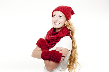 woman wearing scarf, beanie, and thermal gloves thumbnail