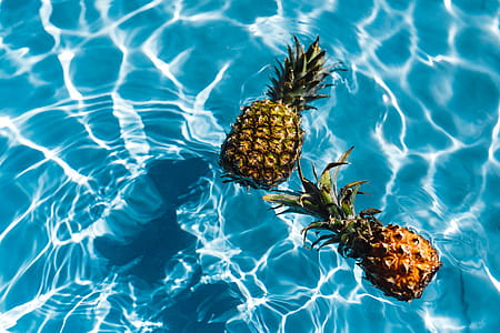 Pineapple in a swimming pool thumbnail