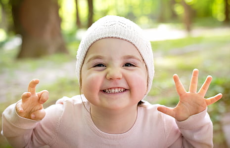 closeup photography of girl wearing pink jacket thumbnail