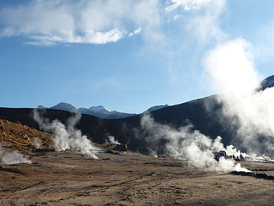 smoke under brown soil during daytime photo thumbnail