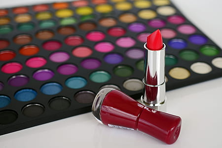 closeup photo of red lipstick and eyeshadow palette thumbnail