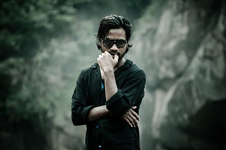 man wearing black long-sleeved collared shirt thumbnail
