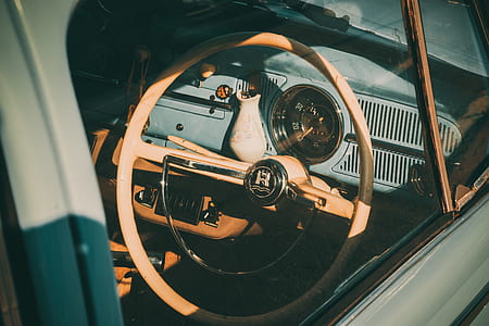 close-up photo of beige vehicle steering wheel thumbnail