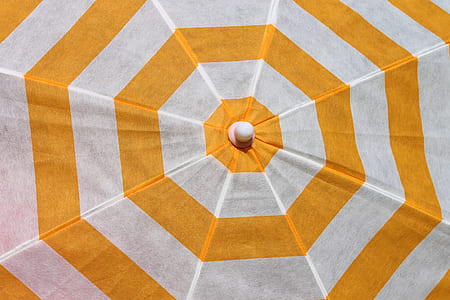 yellow and white striped umbrella thumbnail