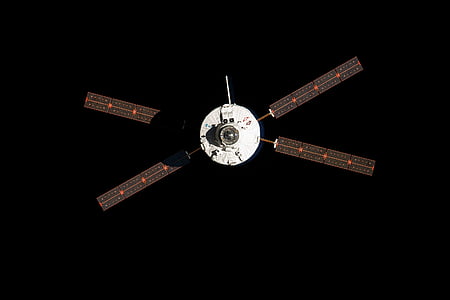 white and brown artificial satellite at night thumbnail