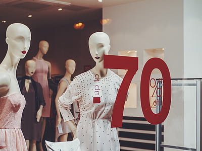 mannequins in dress with 70-printed in clear glass wall thumbnail