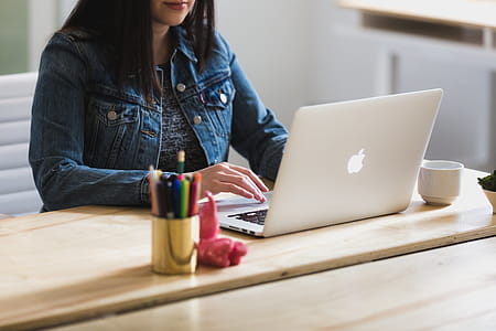 Woman Works At Desk Photo thumbnail