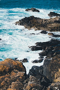 sea waves hitting rocks thumbnail