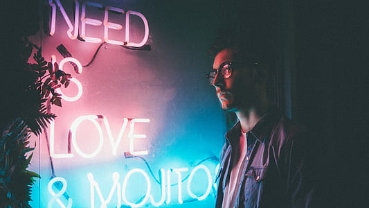 man beside neon light thumbnail