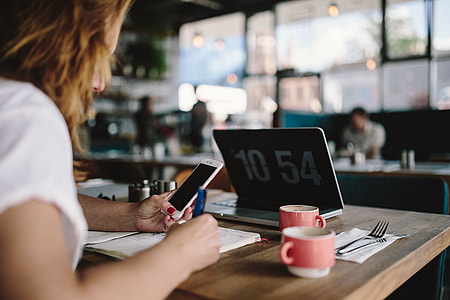 Young woman working in a cafe thumbnail