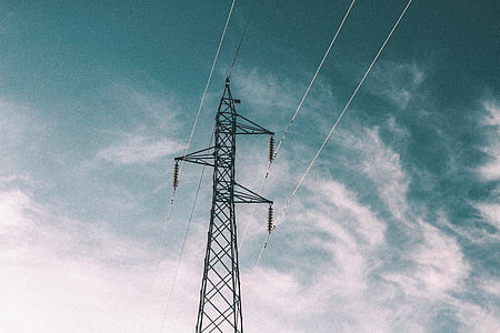 black utility pole under clear blue sky thumbnail
