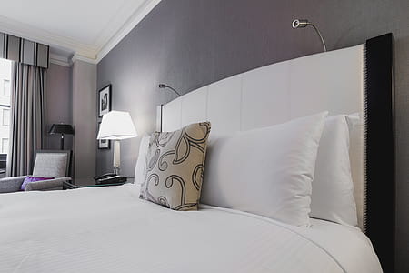 Bright Hotel Room Bed Photo thumbnail