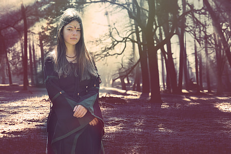 woman standing inside forest thumbnail