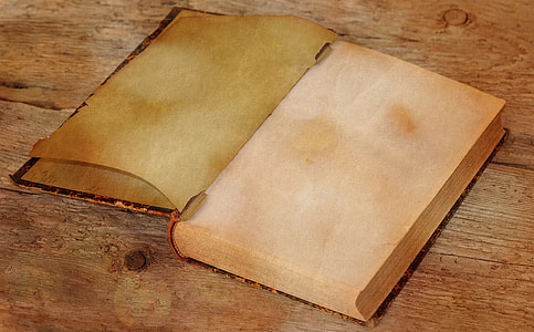 empty page of book above wooden surfac e thumbnail