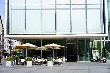 patio table and chairs outside the building thumbnail
