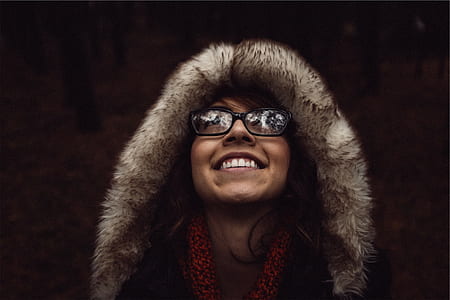 selective focus photography of woman wearing winter coat thumbnail