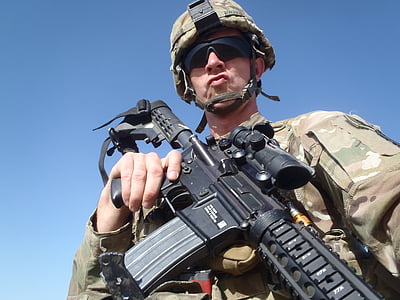 soldier holding assault rifle thumbnail