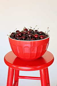 round red fruit lot filled red bowl thumbnail