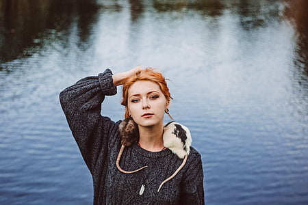 woman in black sweater thumbnail