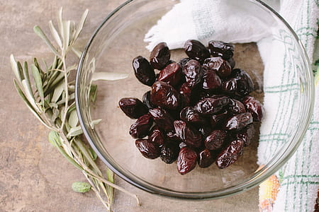 bowl of dates beside white towel thumbnail
