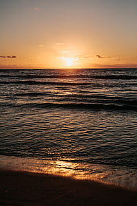 time lapse photography of sunset and sea thumbnail
