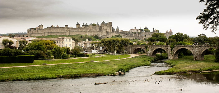 beige concrete castle near bridge and greek thumbnail