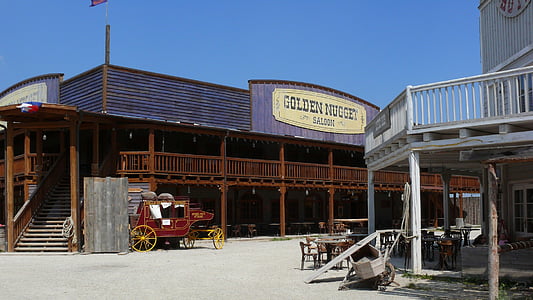 brown painted building at daytime thumbnail