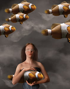 woman holding clown fish graphic wallpaper thumbnail