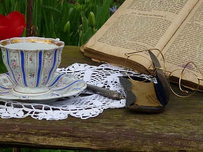 brown framed eyeglasses near reading book thumbnail
