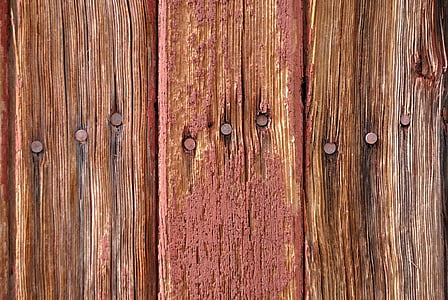 flat lay photography of nail fastened on brown wooden planks thumbnail