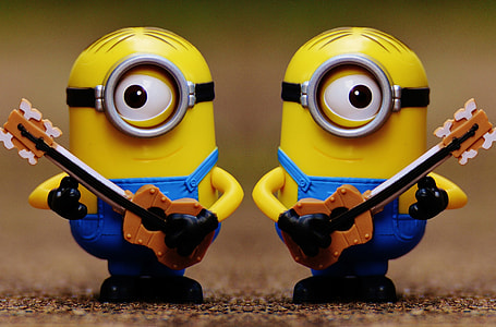 two minion holding guitar toys thumbnail