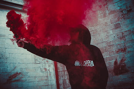 man holding red flare smoke thumbnail