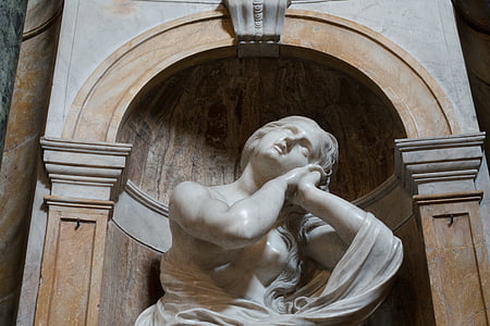 photography of white concrete woman statue thumbnail